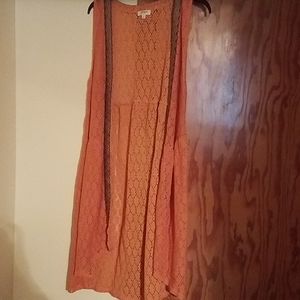 Long sleeveless vest